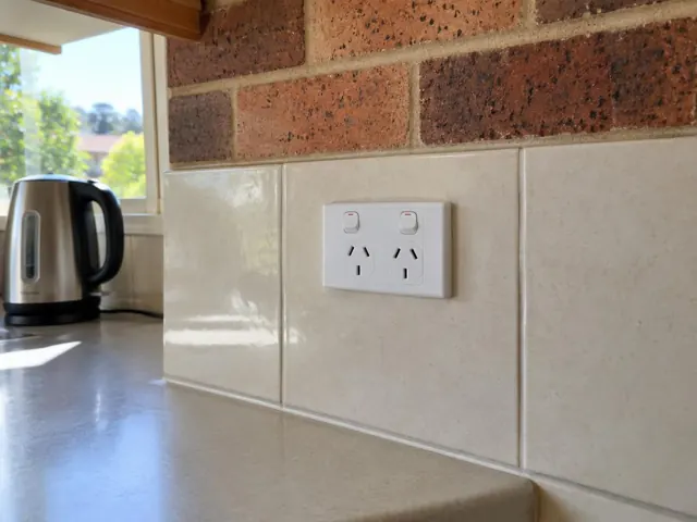 New double power point on a tiled kitchen splashback above a benchtop in Allambie Heights